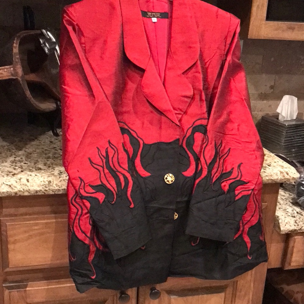 100 percent Jim Thompson silk. Custom made . Never worn. Below the hip length.